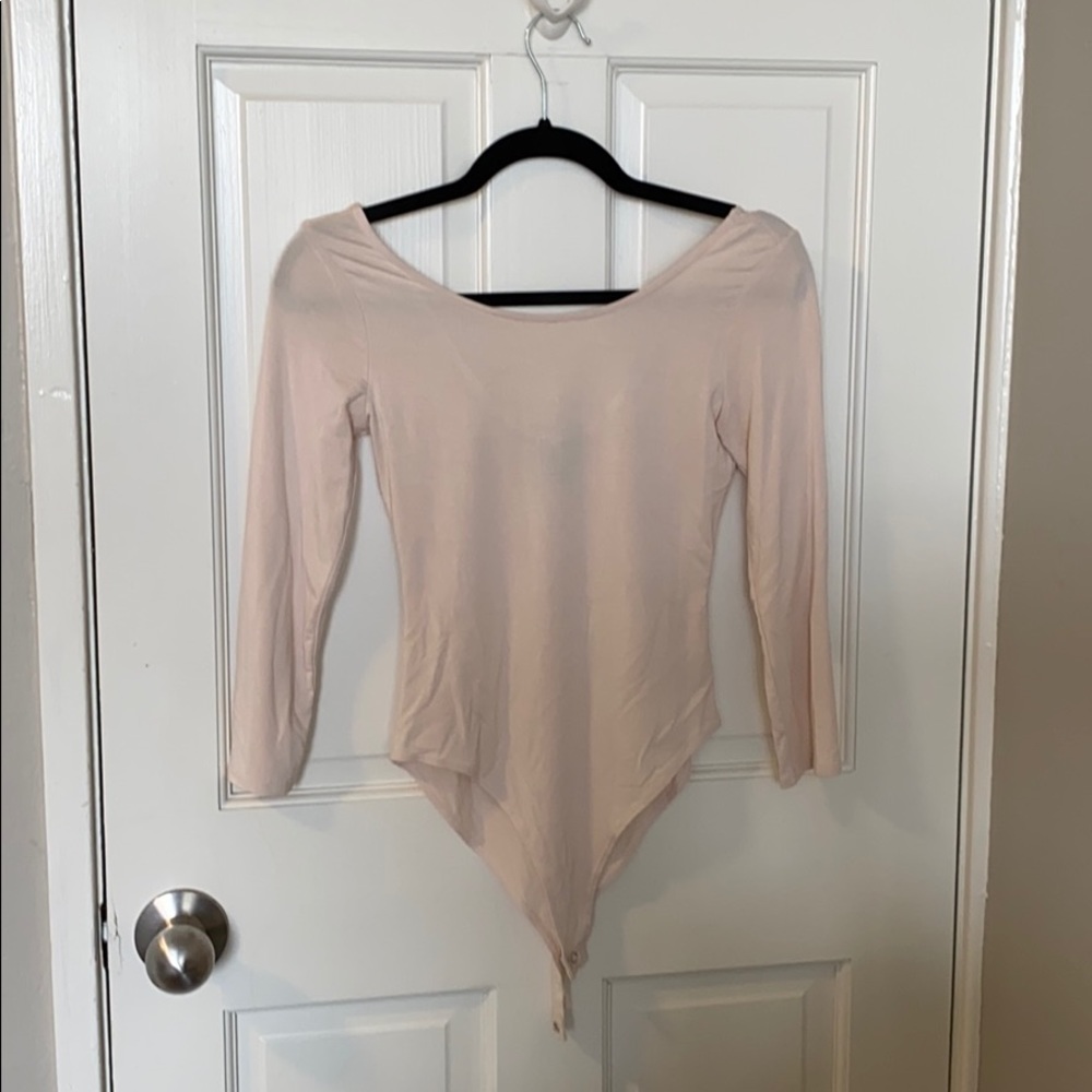 Light pink body suit